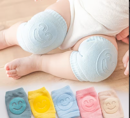 AWE™ Baby Knee Guards in pastel colours with smiley face emboss
